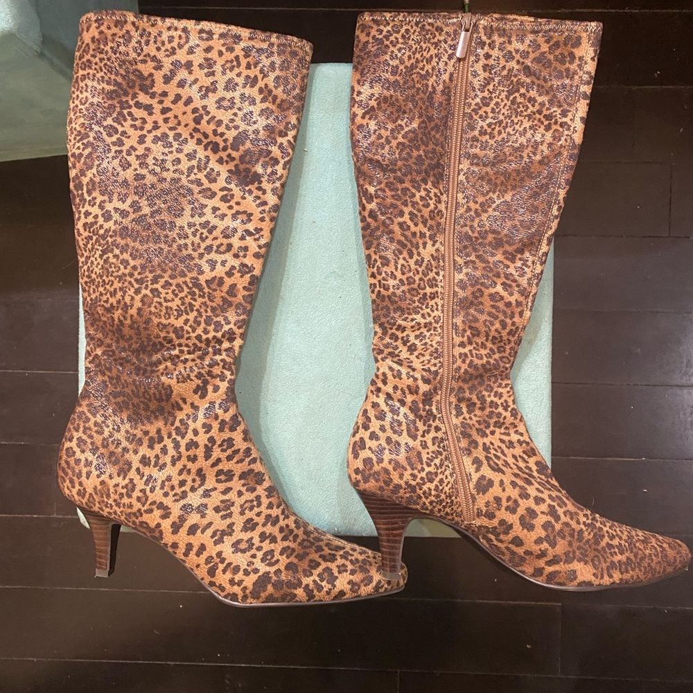 Knee high cheetah print boots